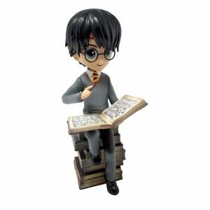 Harry Potter Estatua Harry And The Pile Of Spell Book 21 Cm